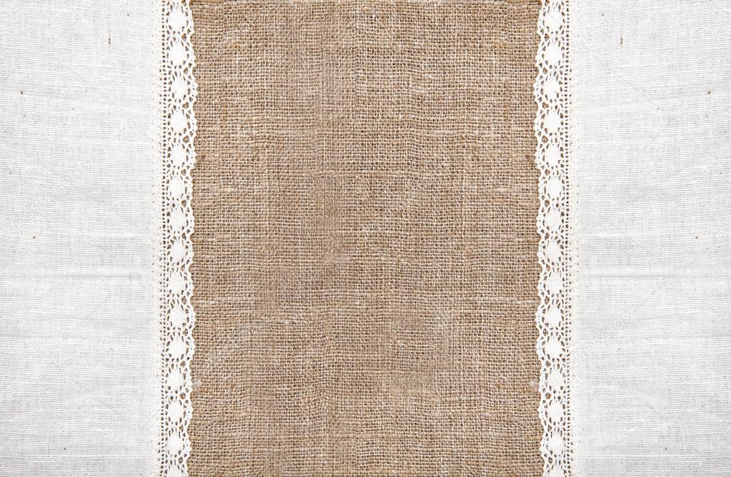 Burlap background with linen lacy cloth