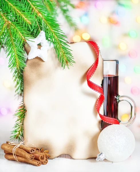 Christmas card with mulled wine, decor and cinnamon — Stock Photo, Image