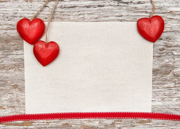 Valentine card with hearts on canvas — Stock Photo, Image