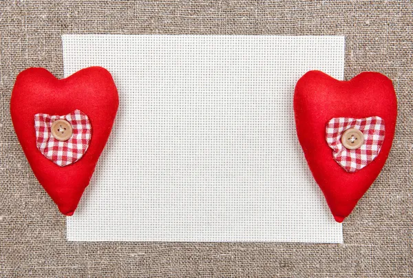 Valentine card with red textile hearts — Stock Photo, Image