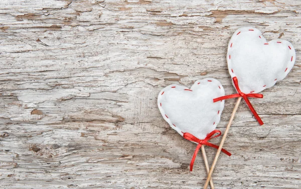 Textile hearts on old wood — Stock Photo, Image