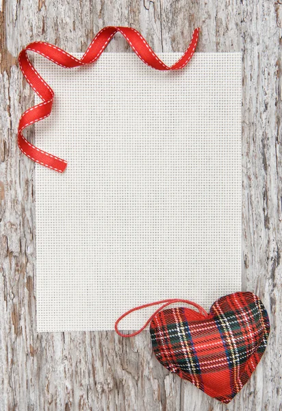 Valentine card with textile heart on old wood — Stock Photo, Image