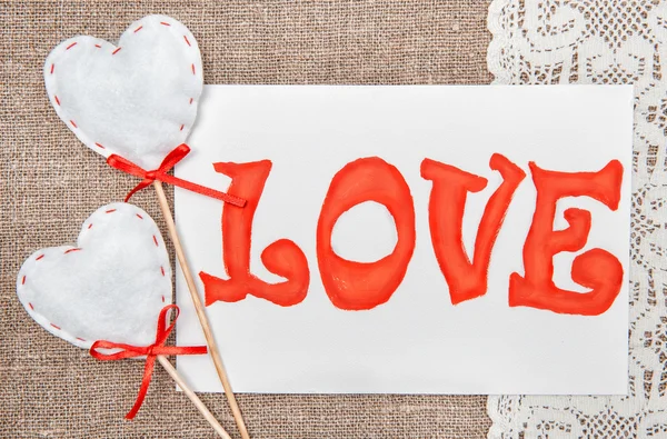Valentine card with drawing word love on lace — Stock Photo, Image