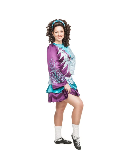 Young woman in irish dance dress posing isolated — Stock Photo, Image