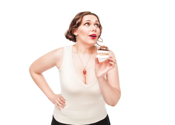Beautiful plus size woman temptating with pastry — Stock Photo, Image