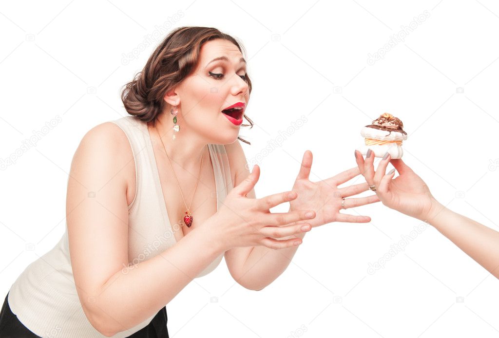 Beautiful plus size woman temptating with pastry