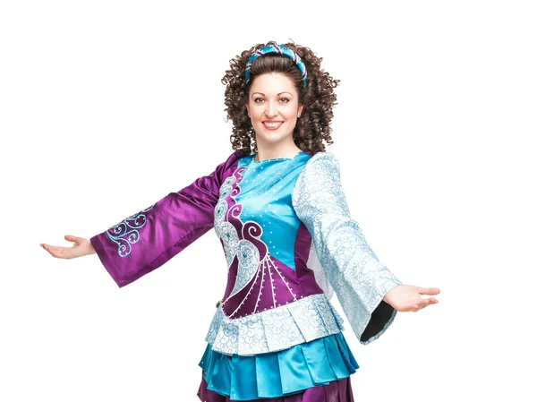 Young woman in irish dance dress welcoming — Stock Photo, Image