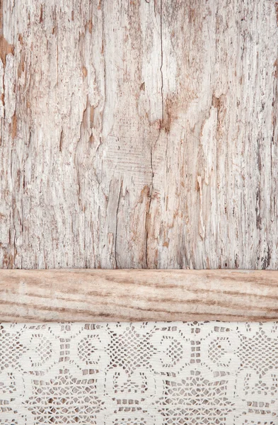 Koronkowy materiał na stare drewniane tła — Zdjęcie stockowe
