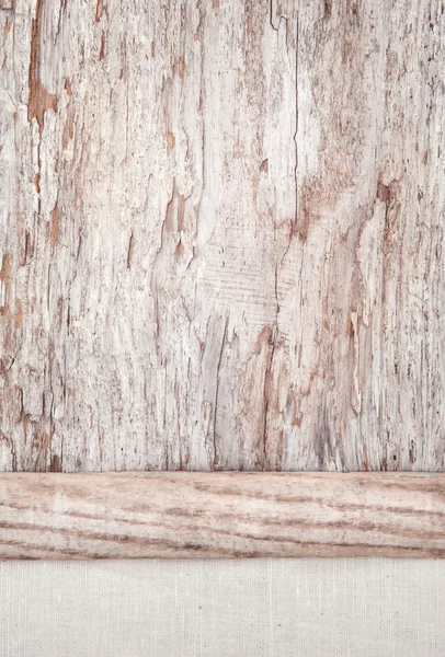 Tessuto di lino sul vecchio sfondo di legno — Foto Stock