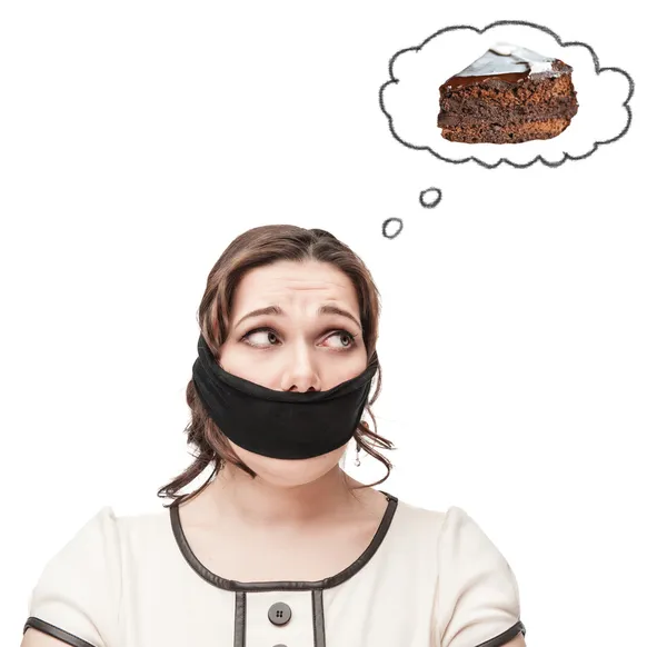 Geknebelte Plus Size Frau träumt von Kuchen — Stockfoto