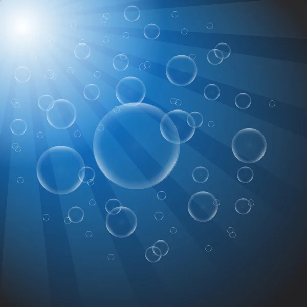 Burbujas de jabón sobre un fondo azul — Foto de Stock