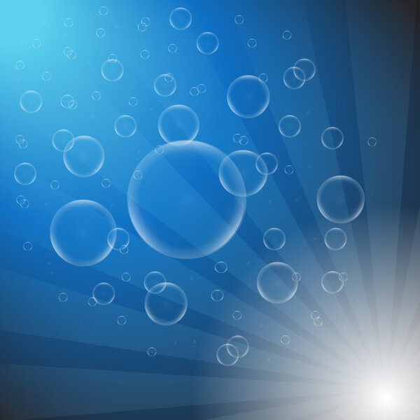 Soap bubbles on a blue background