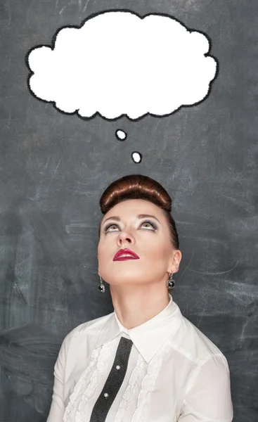 Beautiful thoughtful woman looking up above on something — Stock Photo, Image