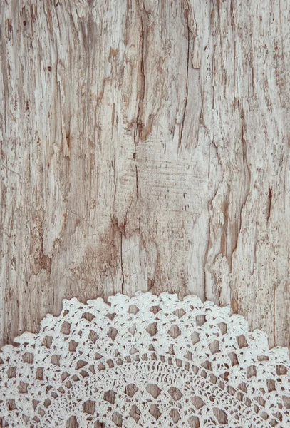 Dantel kumaş üzerine eski ahşap — Stok fotoğraf
