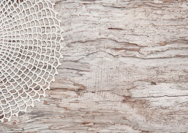 Lace fabric on the old wood — Stock Photo, Image
