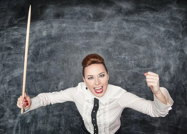 Angry screaming teacher with pointer — Stock Photo, Image