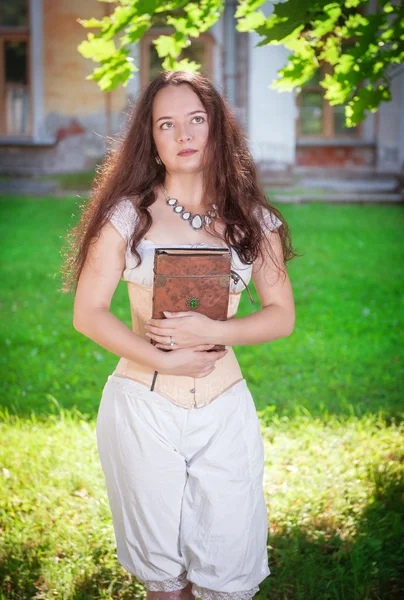 Beautiful woman in corset and trousers — Stock Photo, Image