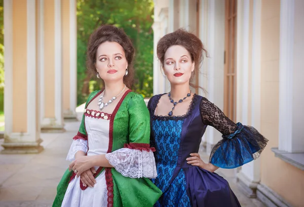 Two beautiful women in medieval dresses — Stock Photo, Image