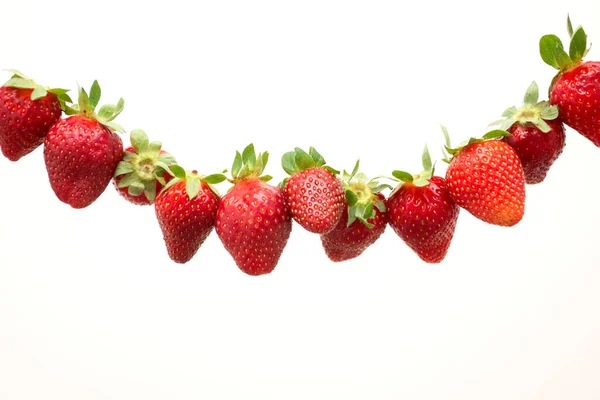 Garland Red Ripe Strawberries Hanging Isolated White Background — Stockfoto