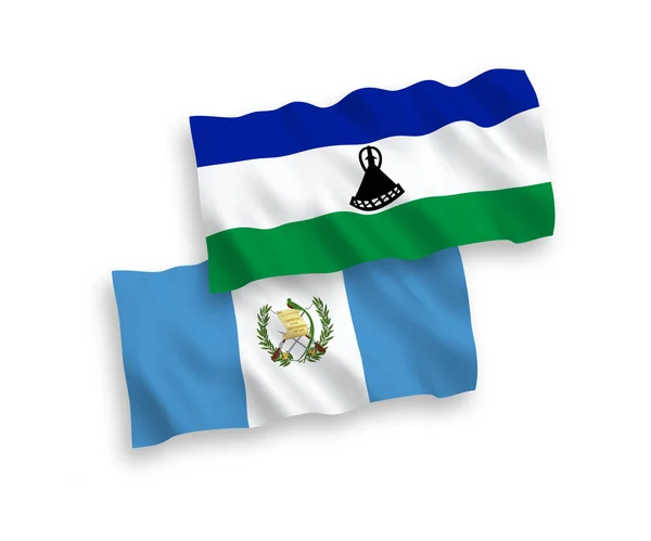 Bandeiras da República da Guatemala e Lesoto sobre fundo branco —  Vetores de Stock