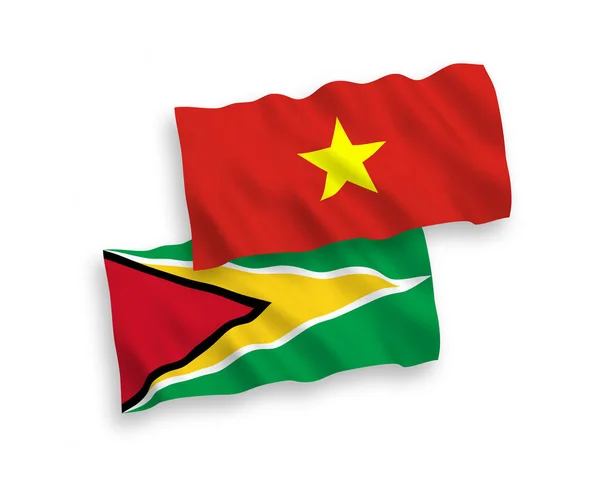 Drapeaux de la République coopérative de Guyane et du Vietnam sur fond blanc — Image vectorielle