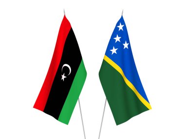 Libya ve Solomon Adaları 'nın ulusal kumaş bayrakları beyaz arka planda izole edildi. 3d resimleme.