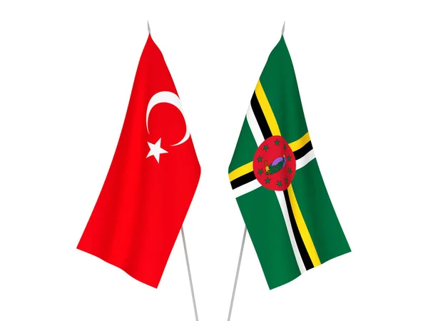 stock image National fabric flags of Dominica and Turkey isolated on white background. 3d rendering illustration.