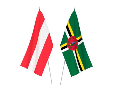 Dominica ve Avusturya 'nın ulusal kumaş bayrakları beyaz arka planda izole edildi. 3d resimleme.
