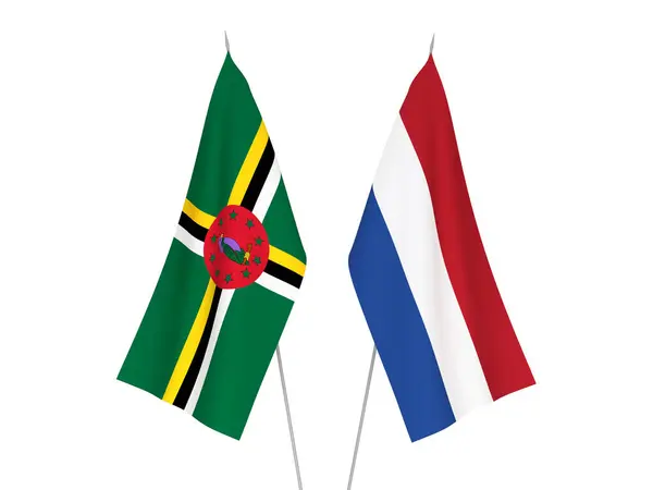 Netherlands and Dominica flags — 图库照片