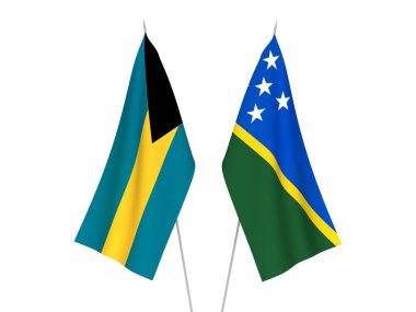 Bahamalar ve Solomon Adaları 'nın ulusal kumaş bayrakları beyaz arka planda izole edilmiştir. 3d resimleme.