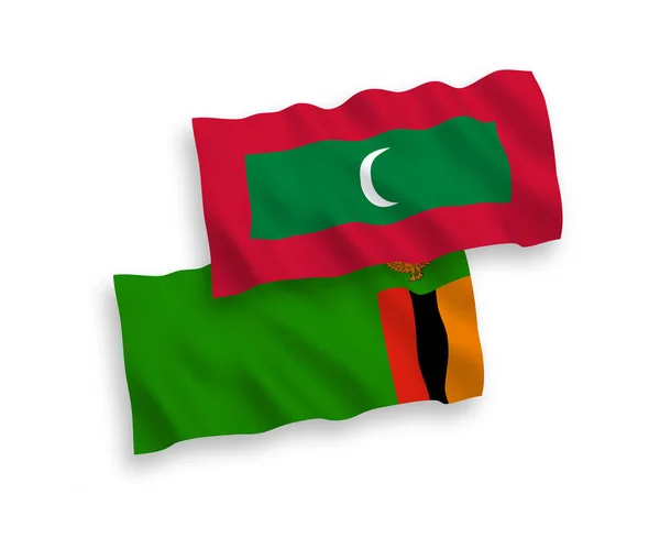 Прапори Республіки Замбія і Мальдівів на білому тлі — стоковий вектор
