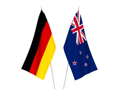 Beyaz arka planda Almanya ve Yeni Zelanda 'nın ulusal kumaş bayrakları izole edildi. 3d resimleme.