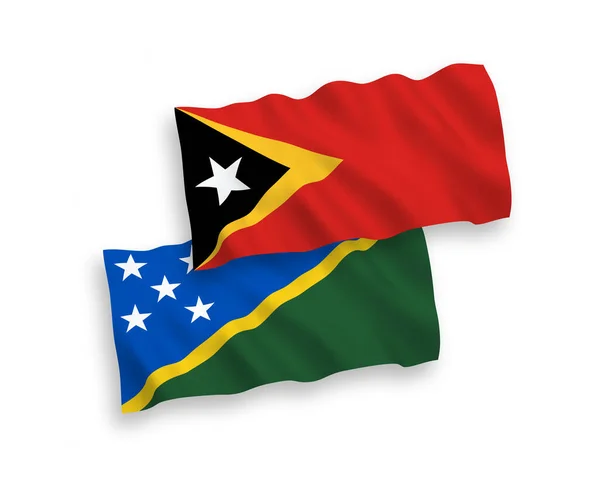 Narodowe Flagi Tkanin Wektorowych Wysp Salomona Timoru Wschodniego Odizolowane Białym — Wektor stockowy