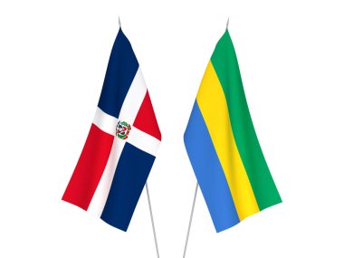 Beyaz arka planda Gabon ve Dominik Cumhuriyeti 'nin ulusal kumaş bayrakları izole edildi. 3d resimleme.