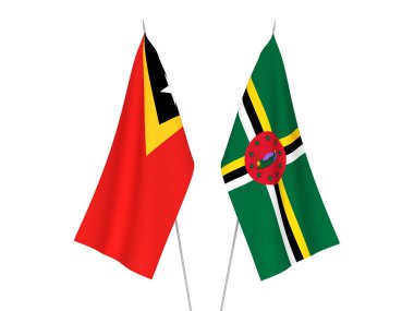 Beyaz arka planda Doğu Timor ve Dominica 'nın ulusal kumaş bayrakları izole edildi. 3d resimleme.