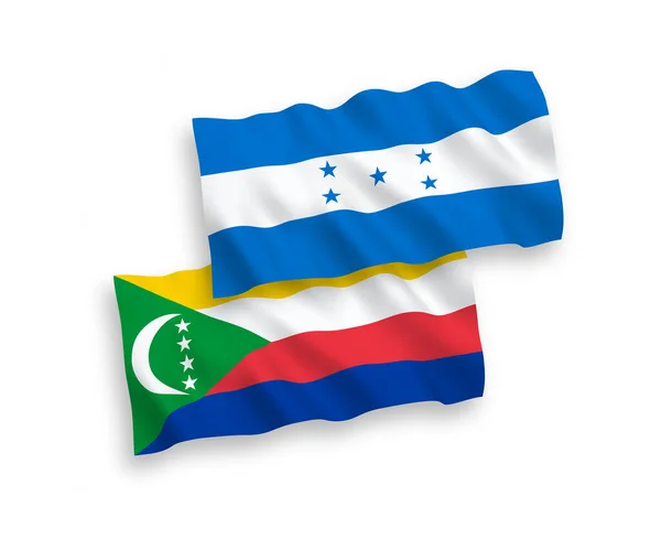 科摩罗联盟和洪都拉斯联盟的国家病媒织物波条旗在白色背景下隔离 1比2的比例 — 图库矢量图片