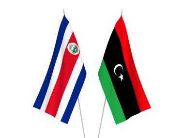 Libya ve Kosta Rika Cumhuriyeti 'nin ulusal kumaş bayrakları beyaz arka planda izole edildi. 3d resimleme.