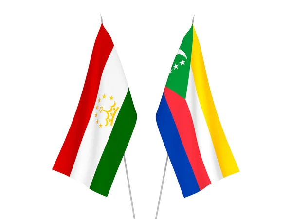 Tajikistan and Union of the Comoros flags — Fotografia de Stock