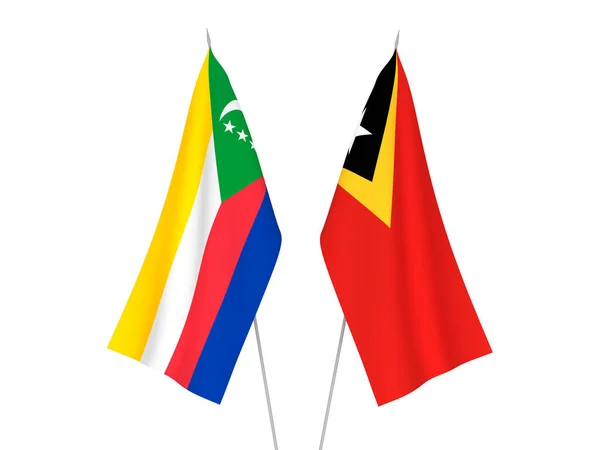 East Timor and Union of the Comoros flags — Photo