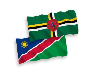 Dominika ve Namibya Cumhuriyeti 'nin ulusal taşıyıcı kumaş bayrakları beyaz arka planda izole edildi. 1 'e 2 oranında.