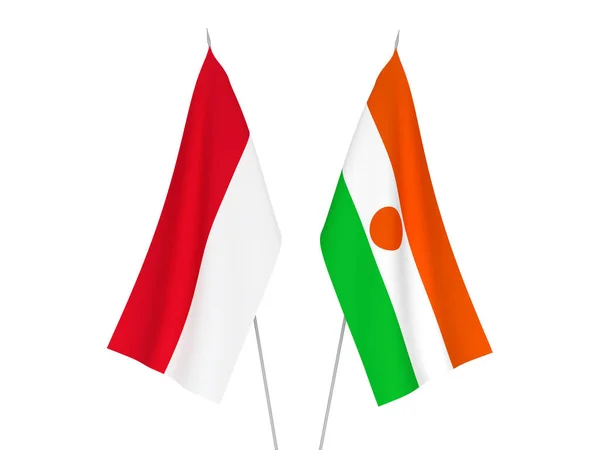 니제르와 인도네시아 공화국의 깃발은 바탕에 분리되어 있었다 렌더링 — 스톡 사진
