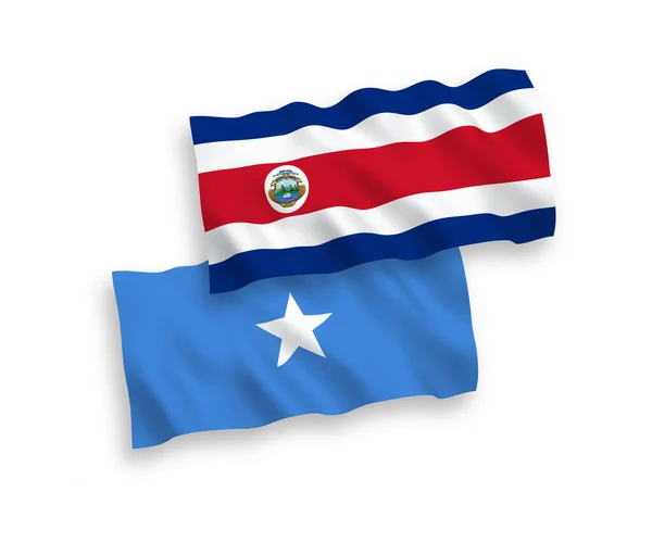 白い背景にコスタリカとソマリアの国旗 — ストックベクタ