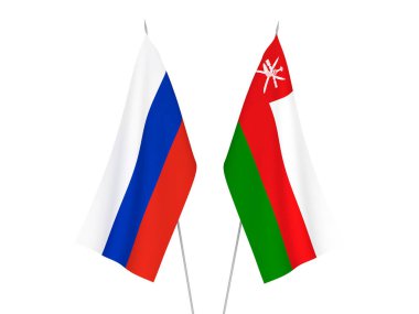 Beyaz arka planda Rusya 'nın ulusal kumaş bayrakları ve Umman Sultanlığı izole edildi. 3d resimleme.