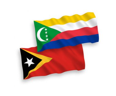 National vector fabric wave flags of Union of the Comoros and East Timor isolated on white background. 1 to 2 proportion.