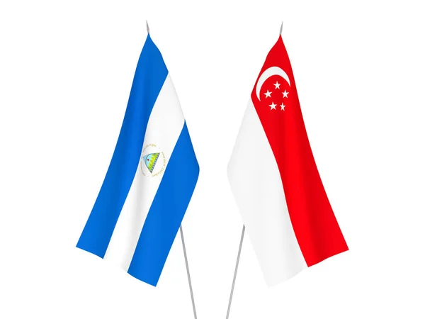 Narodowe Flagi Tkanin Nikaragui Singapuru Izolowane Białym Tle Ilustracja Renderowania — Zdjęcie stockowe