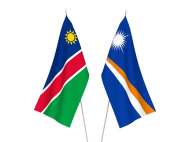 Beyaz arka planda Marshall Adaları Cumhuriyeti ve Namibya Cumhuriyeti 'nin ulusal kumaş bayrakları izole edildi. 3d resimleme.