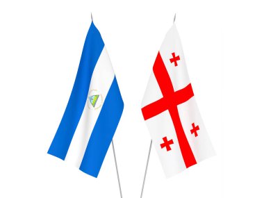 Beyaz arka planda Gürcistan ve Nikaragua 'nın ulusal kumaş bayrakları izole edildi. 3d resimleme.