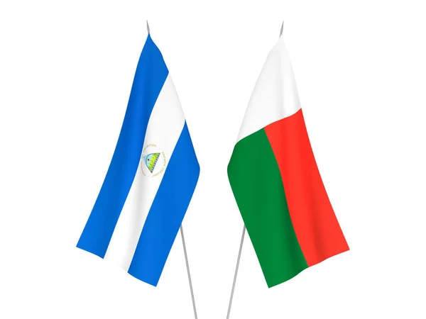 Nationale Stoffen Vlaggen Van Madagaskar Nicaragua Geïsoleerd Witte Achtergrond Weergave — Stockfoto