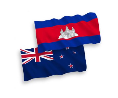 National vector fabric wave flags of New Zealand and Kingdom of Cambodia isolated on white background. 1 to 2 proportion.