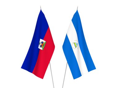 National fabric flags of Nicaragua and Republic of Haiti isolated on white background. 3d rendering illustration.